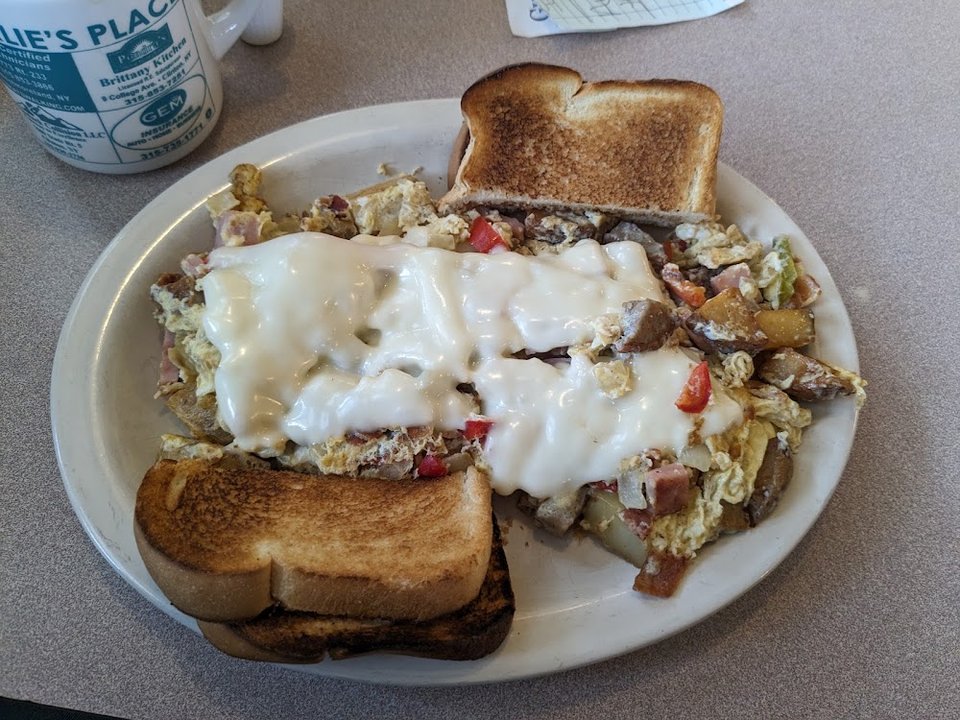 Breakfast menu with omelets and Benedicts.